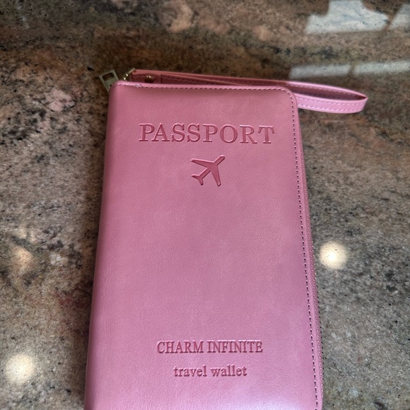 The Unbranded Brand Accessories - Charm Infinite Pink Passport Travel Wallet
